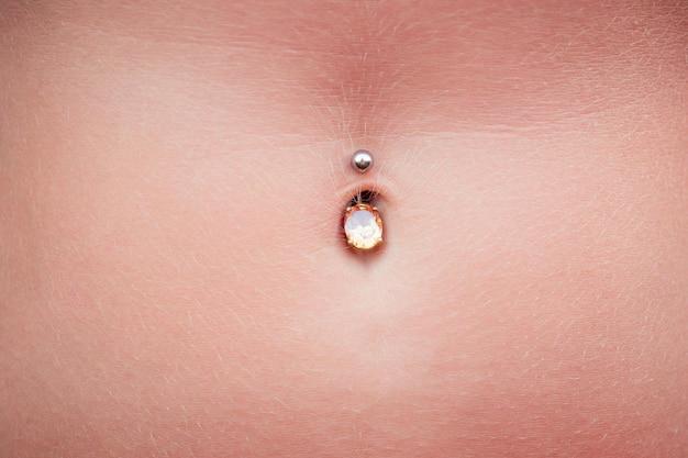 Can a 15 year old get a belly button piercing? 