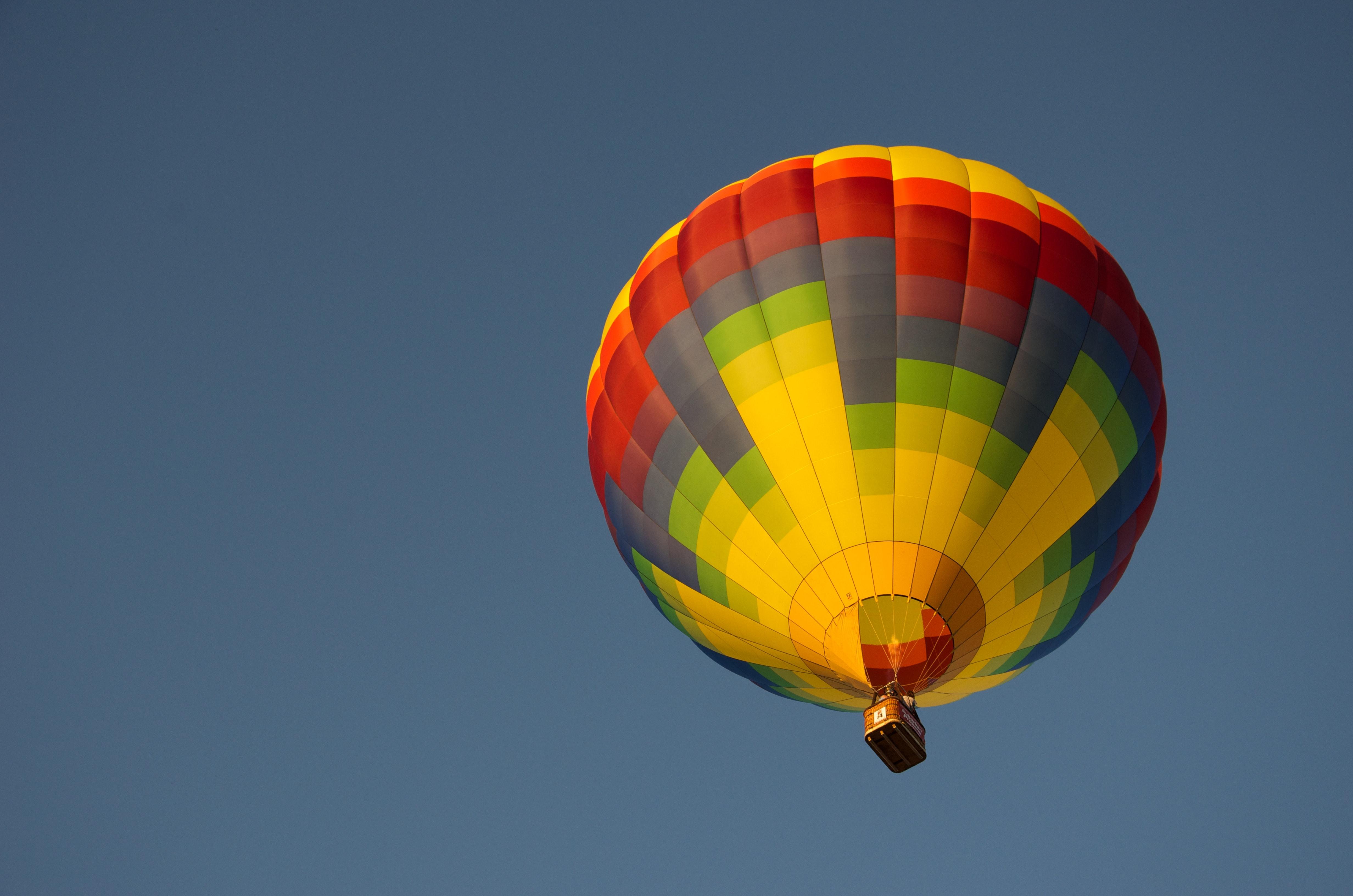 Which gas law best explains how hot air balloons fly? 