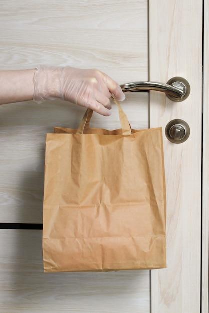 How much weight can a paper and plastic grocery bag hold? 