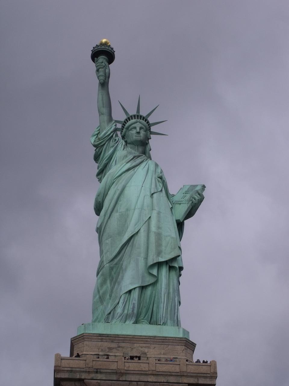 How tall is the Statue of Liberty from feet to torch? 