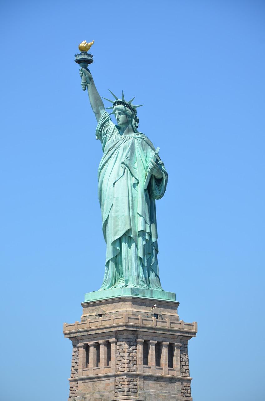 How tall is the Statue of Liberty from feet to torch? 