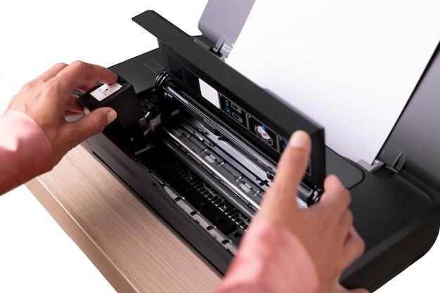 How do you clear a paper jam on a HP OfficeJet 4500? 