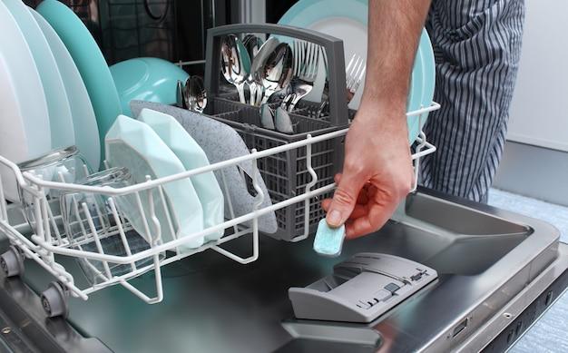 How do I get rid of cloudy dishes in my dishwasher? 