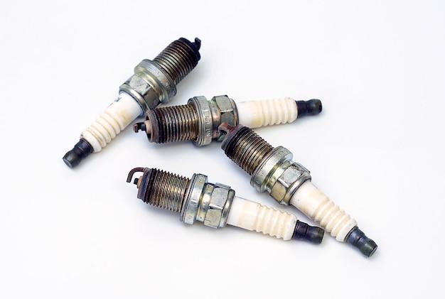 What is the difference between NGK and NGK R spark plugs? 