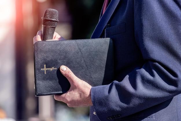 What is the difference between sermon and preaching? 