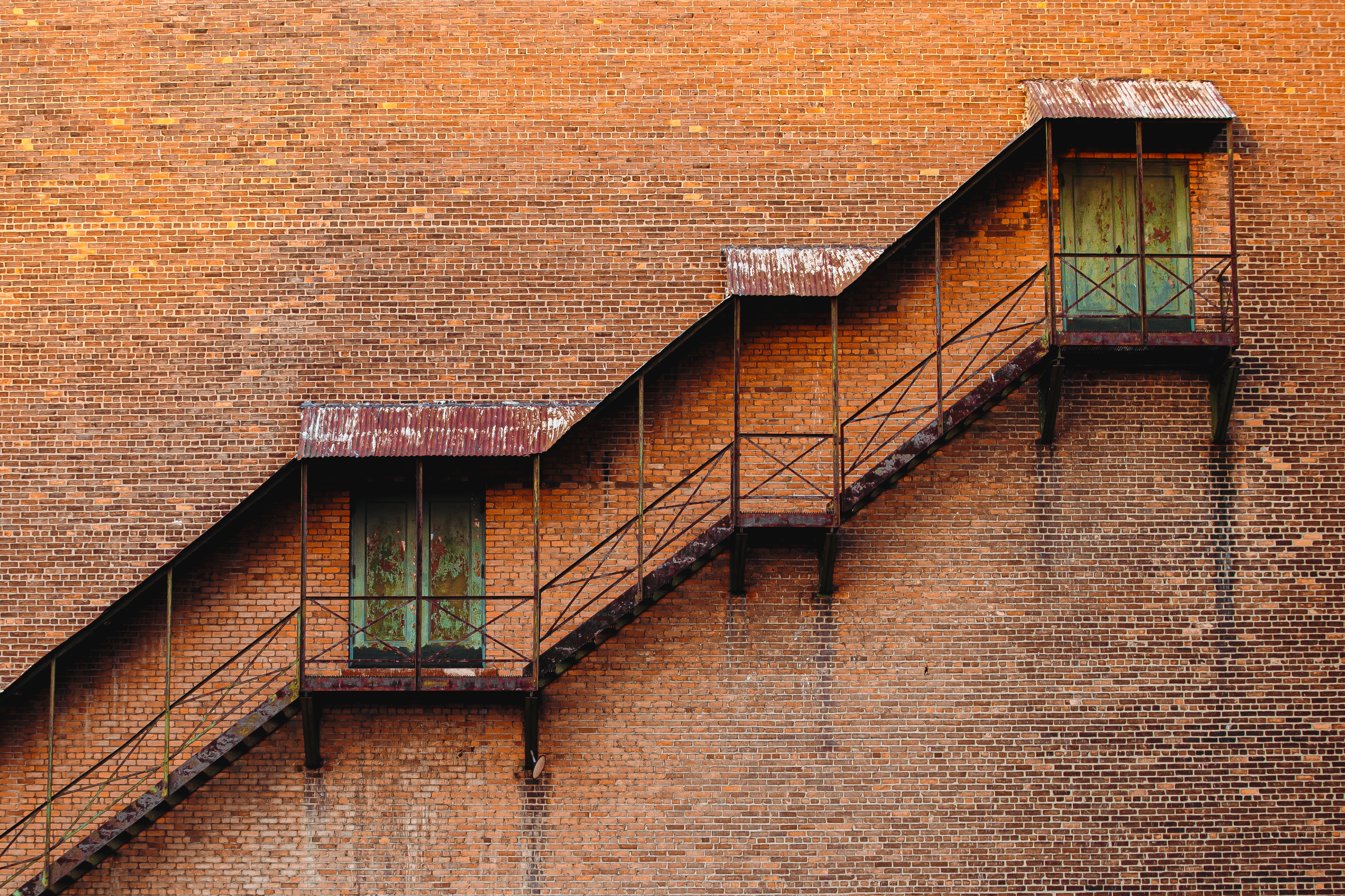 What would fall faster a feather or a brick? 