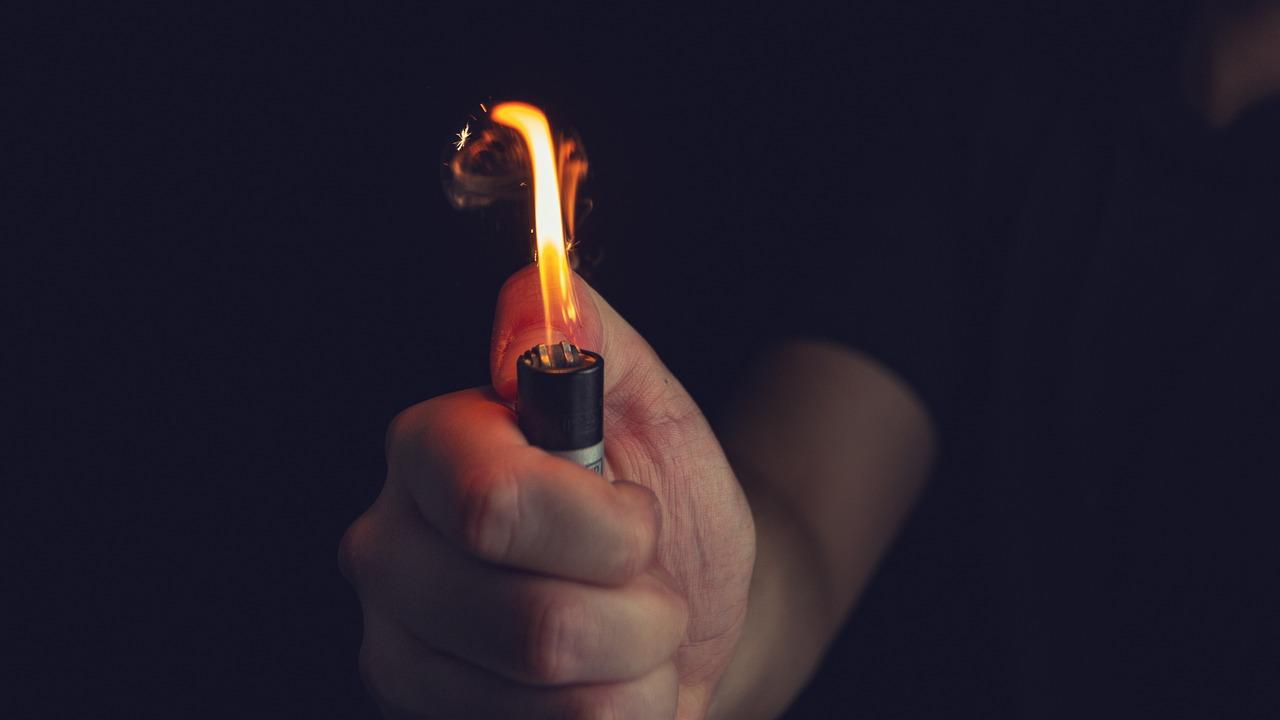 What happens when you put a lighter in the fire? 