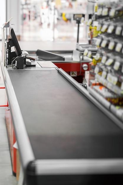What is a grocery store conveyor belt called? 