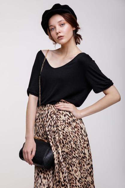 What can you wear with a leopard skirt? 