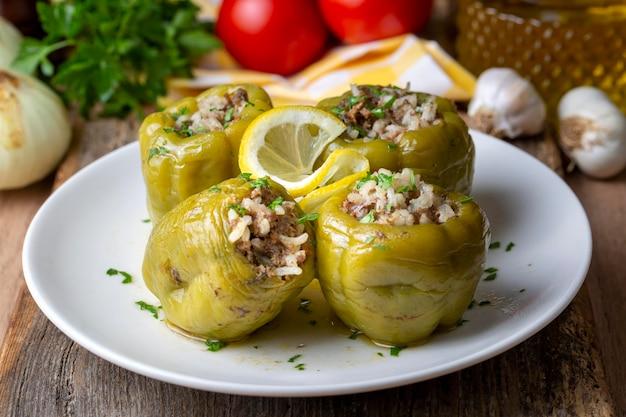 Where did stuffed green peppers originate? 