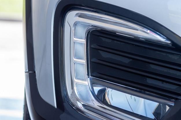 Where is the daytime running light module located? 