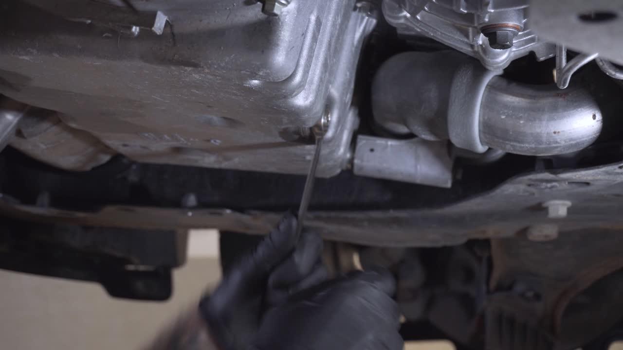Where is the fuel filter located on a Ford Escape? 