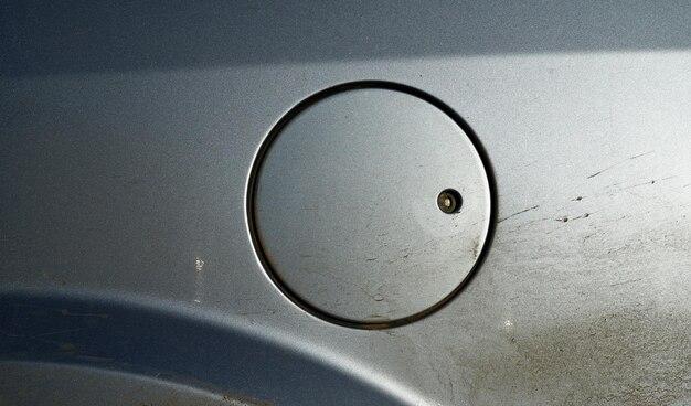 Where is the gas cap release on a Ford Escape? 