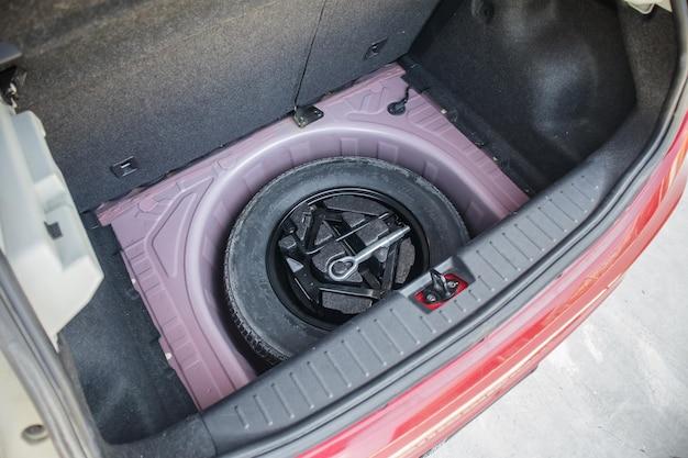 Where is the spare tire located in a Honda Odyssey? 